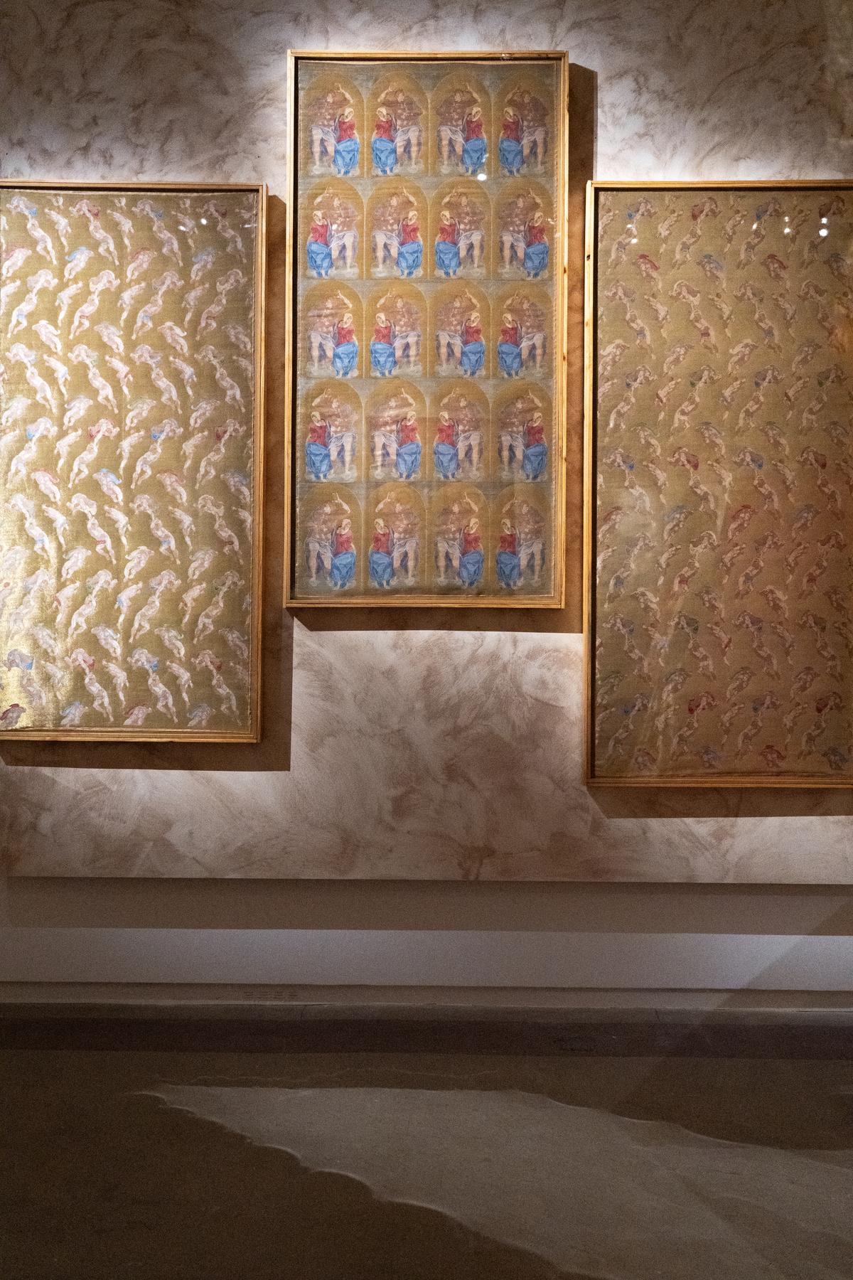 A handwoven triptych, created in the complex technique of samite at the Asha Workshop at Devi Art Foundation. It recreated figurative imagery from frescoes at the Sistine chapel. A handwoven triptych, created in the complex technique of samite at the Asha Workshop at Devi Art Foundation. It recreated figurative imagery from frescoes at the Sistine chapel.