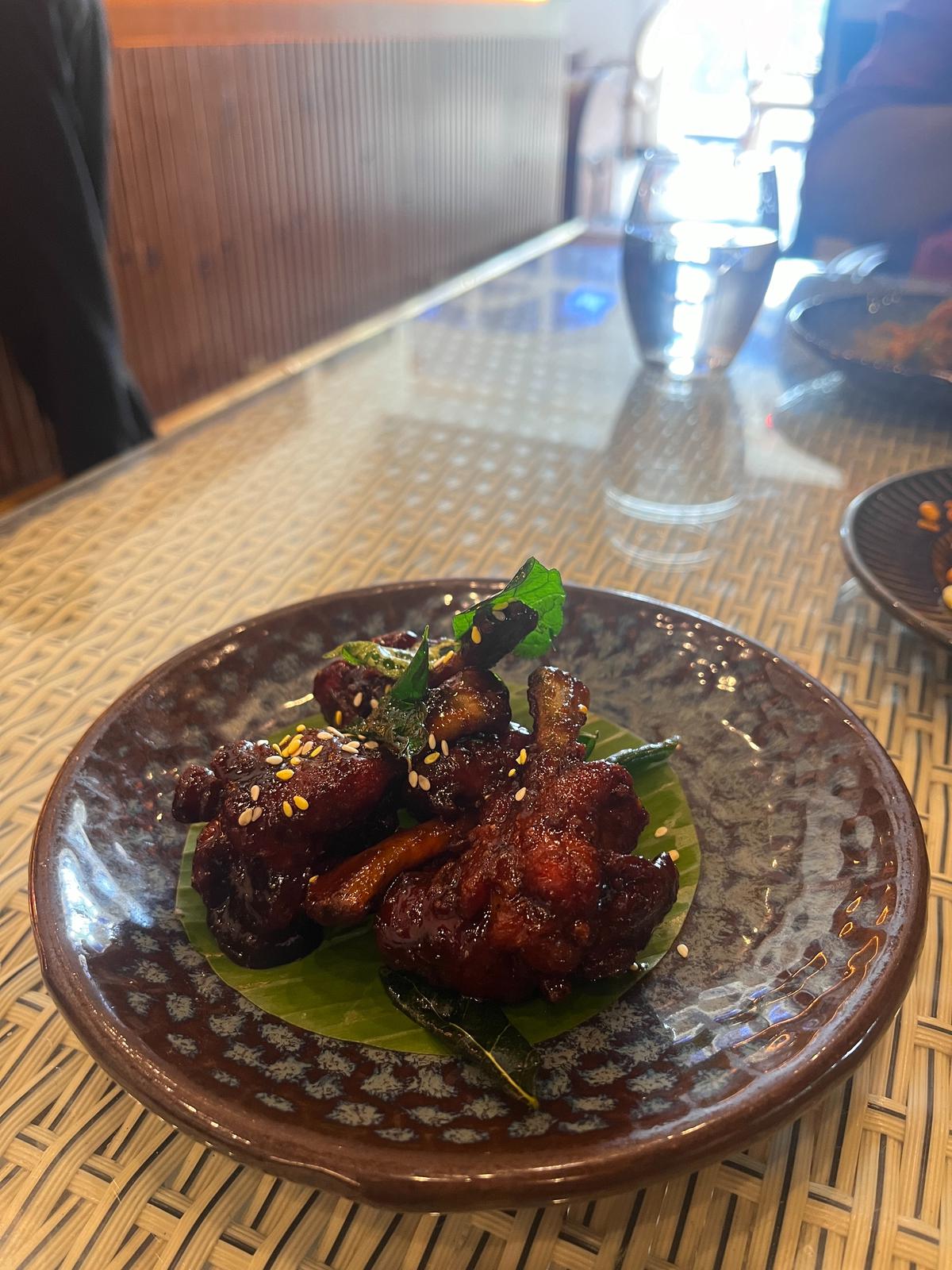 Puliyinchi chicken wings