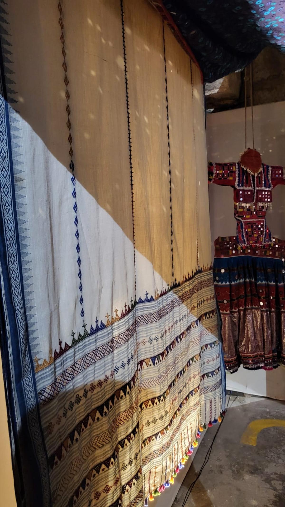Kora Khadi sari with Lambani embroidery by Sandur Kushala Kala Kendra Kora Khadi sari with Lambani embroidery by Sandur Kushala Kala Kendra