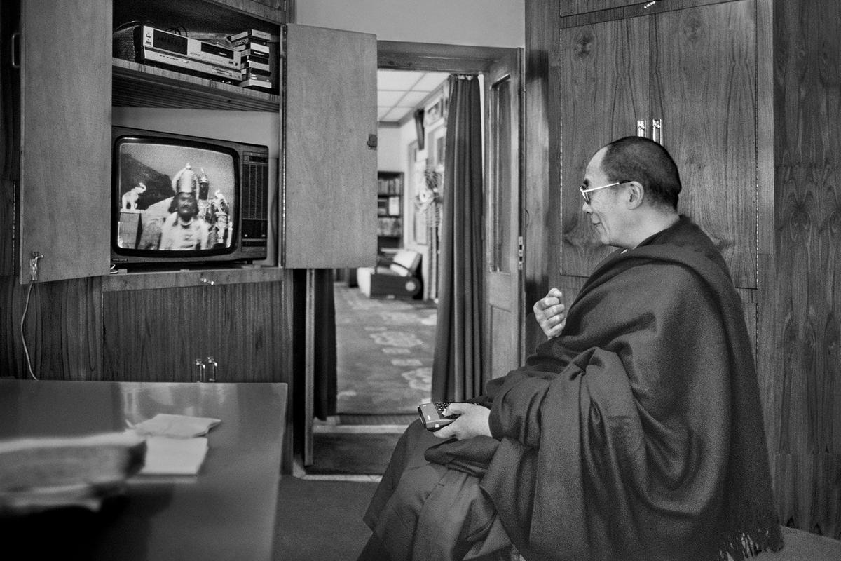 The Dalai Lama watching the serialized television show Mahabharat, in Dharamsala in 1988