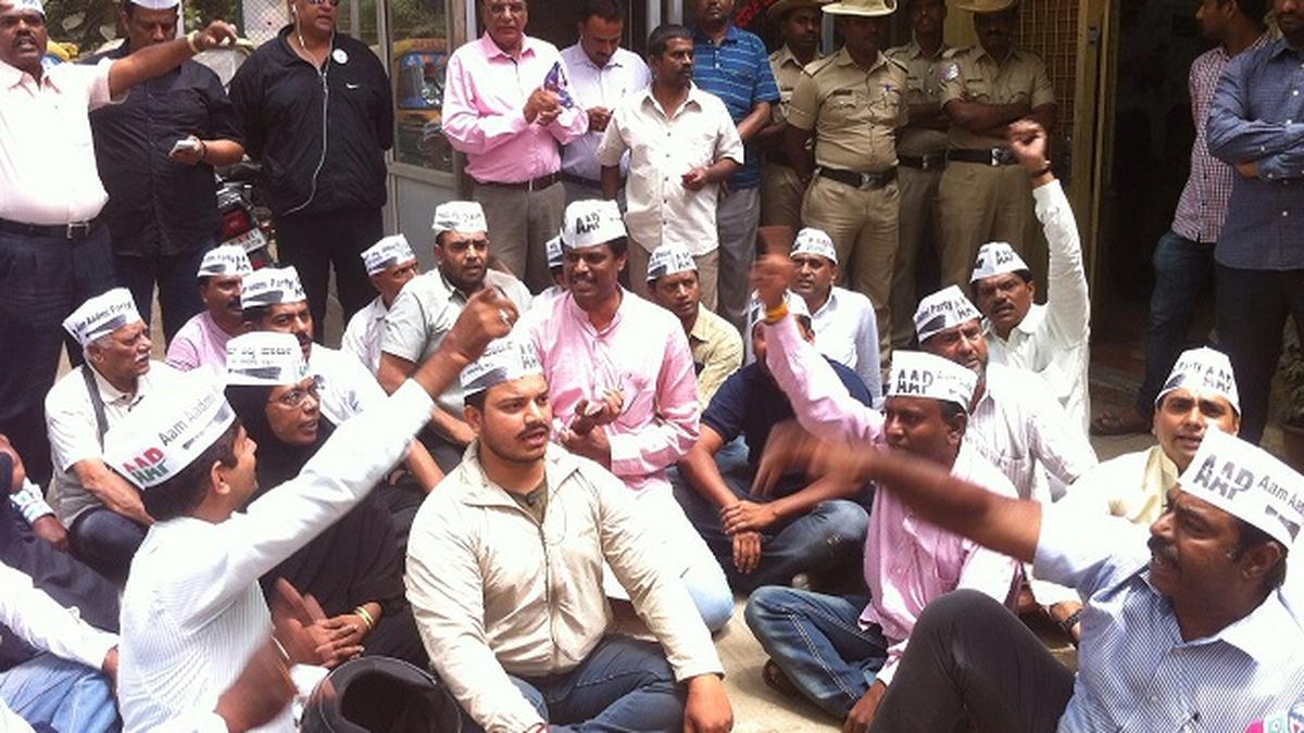 AAP stage protest, demand thorough probe into Lokayukta case The Hindu