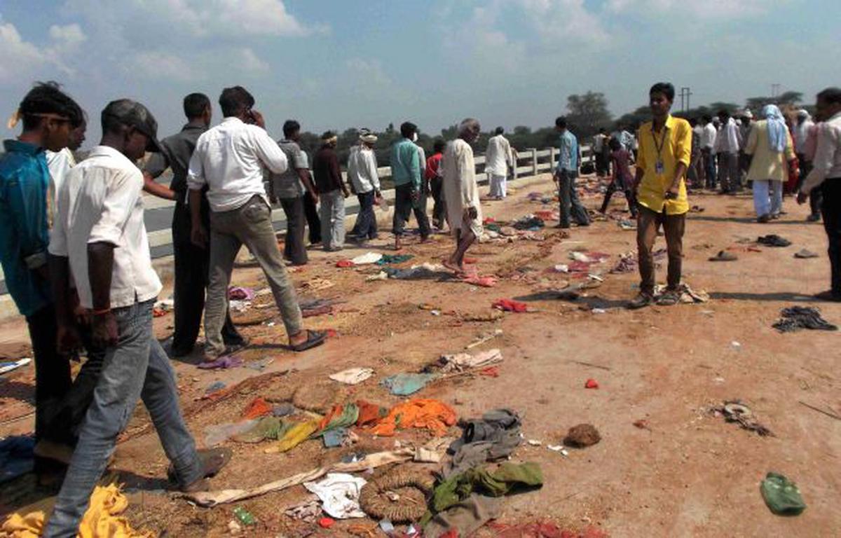 A scene after a stampede at the Sindhu River bridge through which pilgrims were heading towards the Ratangarh temple in Datia district of Madhya Pradesh.