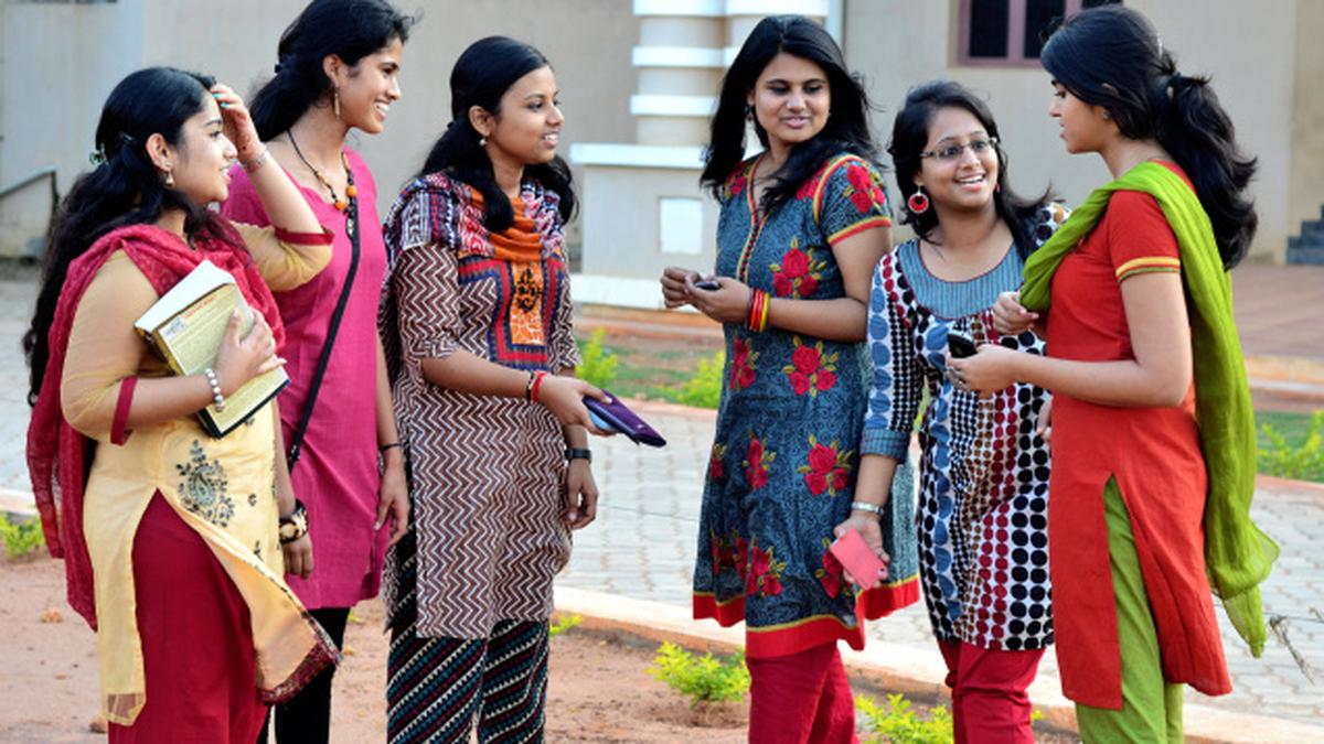 Puffed hair and wayfarer shades The Hindu