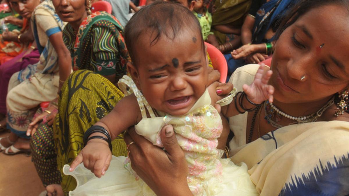 BBMP issues identity cards for ragpickers The Hindu