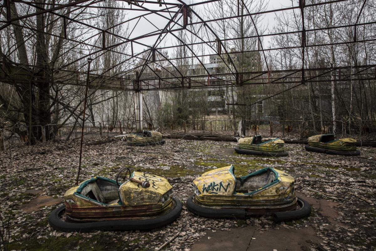 Bumper cars in abandoned Pripyat, Ukraine in the largest city in the exclusion zone surrounding the Chernobyl reactor, April 9, 2016. Thirty years later, there are signs of commercial clear-cutting in supposedly off-limits forests around the site of the nuclear disaster in Ukraine. Photo: The New York Times