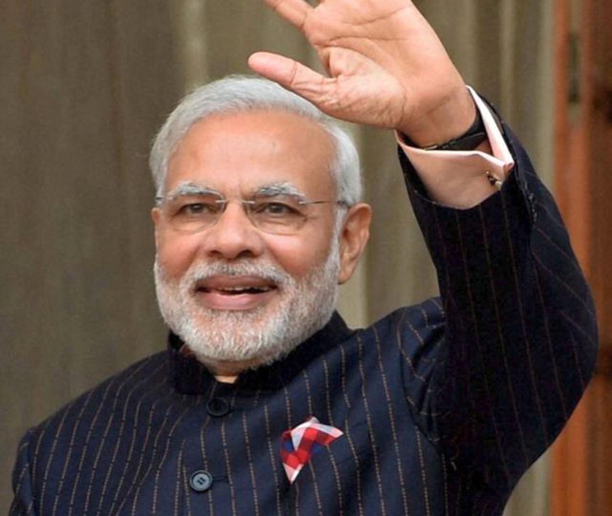 Modi's monogrammed suit enters Guinness Book - The Hindu