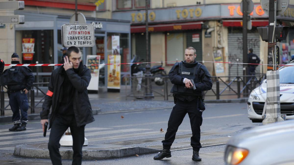 On Charlie Hebdo anniversary, knifewielding man shot dead in Paris