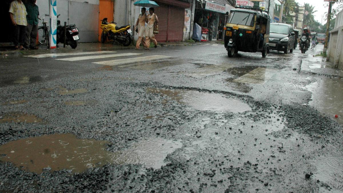 Roads develop potholes as monsoon intensifies - The Hindu