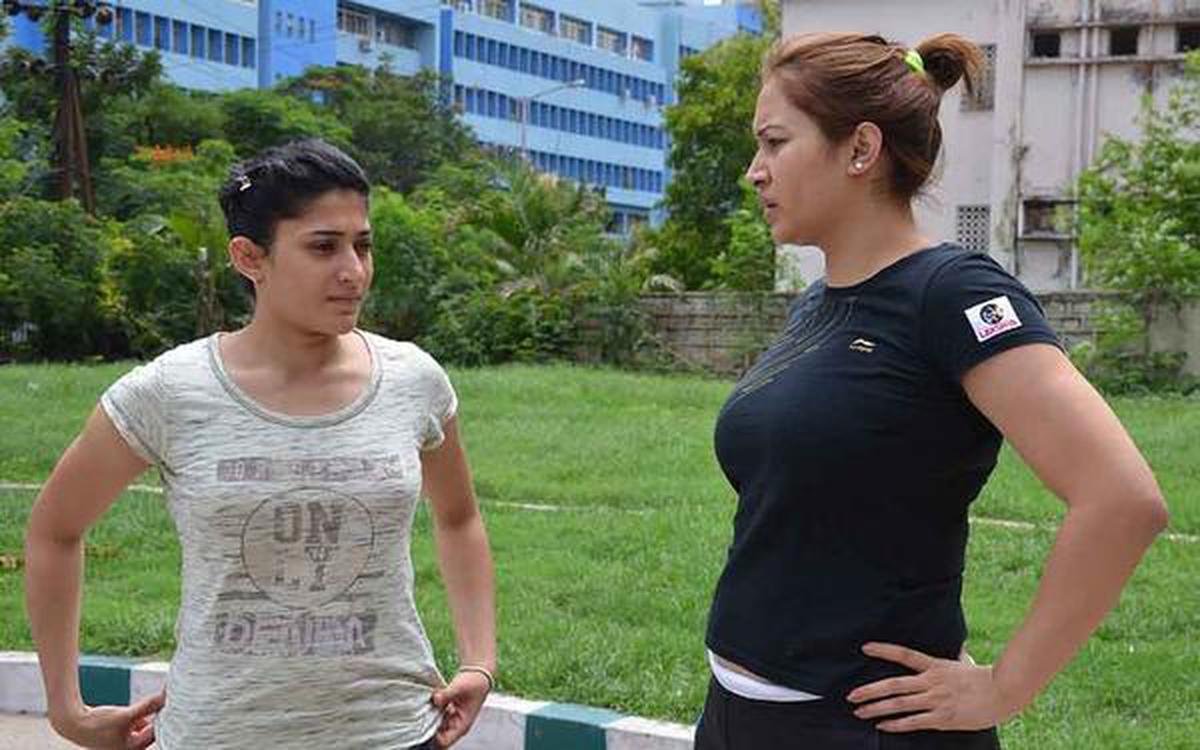 File photo: Badminton players Jwala Gutta (right) and Ashwini Ponnappa, after a training session at Fateh Maidan Indoor Stadium in Hyderabad on July 18, 2014.