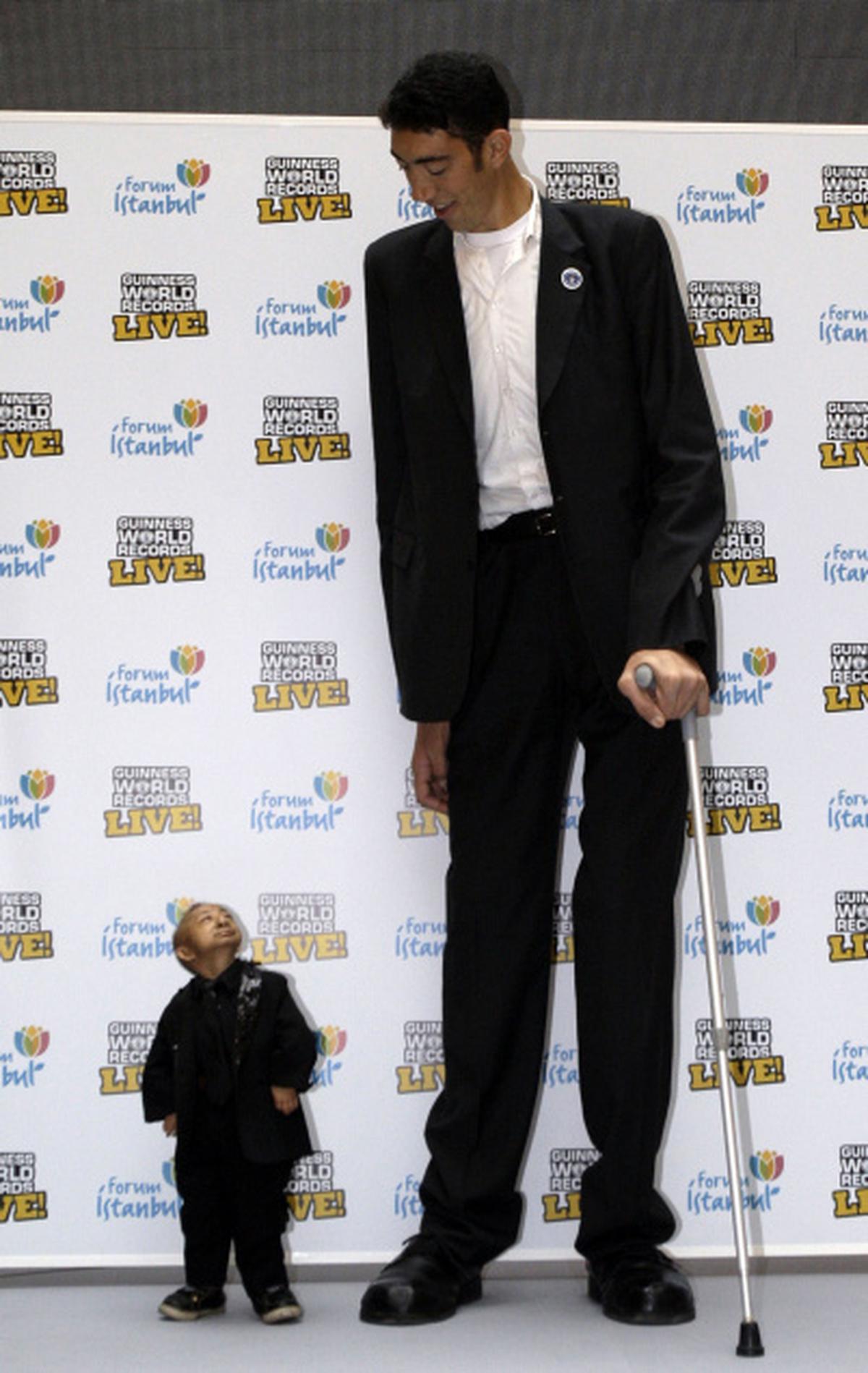 World's tallest man meets world's shortest man