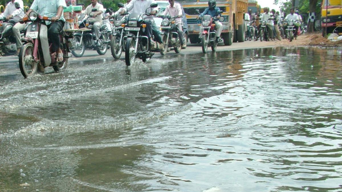 Choked drain leaves motorists in troubled water The Hindu