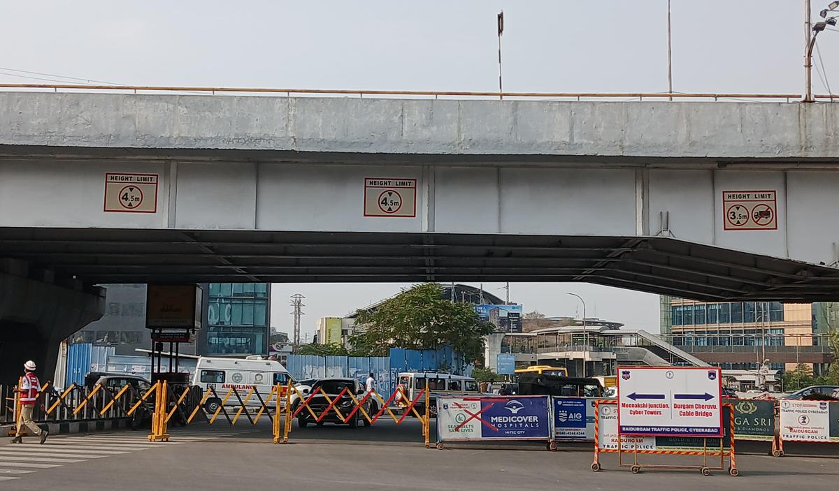 Barricades placed at the IKEA rotary junction after latest curbs were imposed by Cyberabad Traffic Police to mitigate traffic.