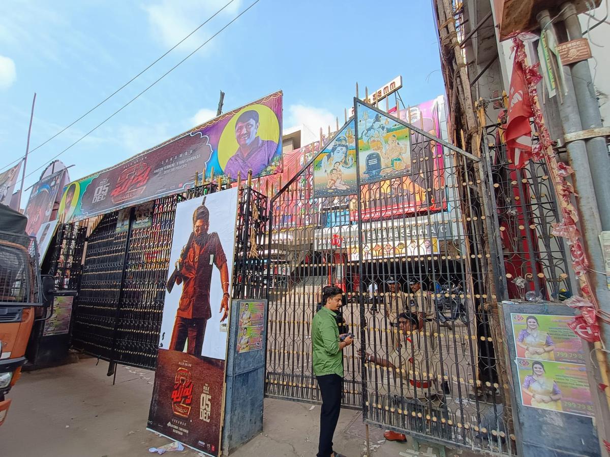 People waiting for the next show at Sandhya Theatre in RTC Cross Roads, Hyderabad, a day after a woman was killed in a melee at the cinema hall on Wednesday (December 4, 2024)