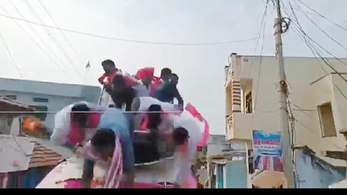 KTR, MP Suresh Reddy escape mishap after they fall from the top of campaigning van