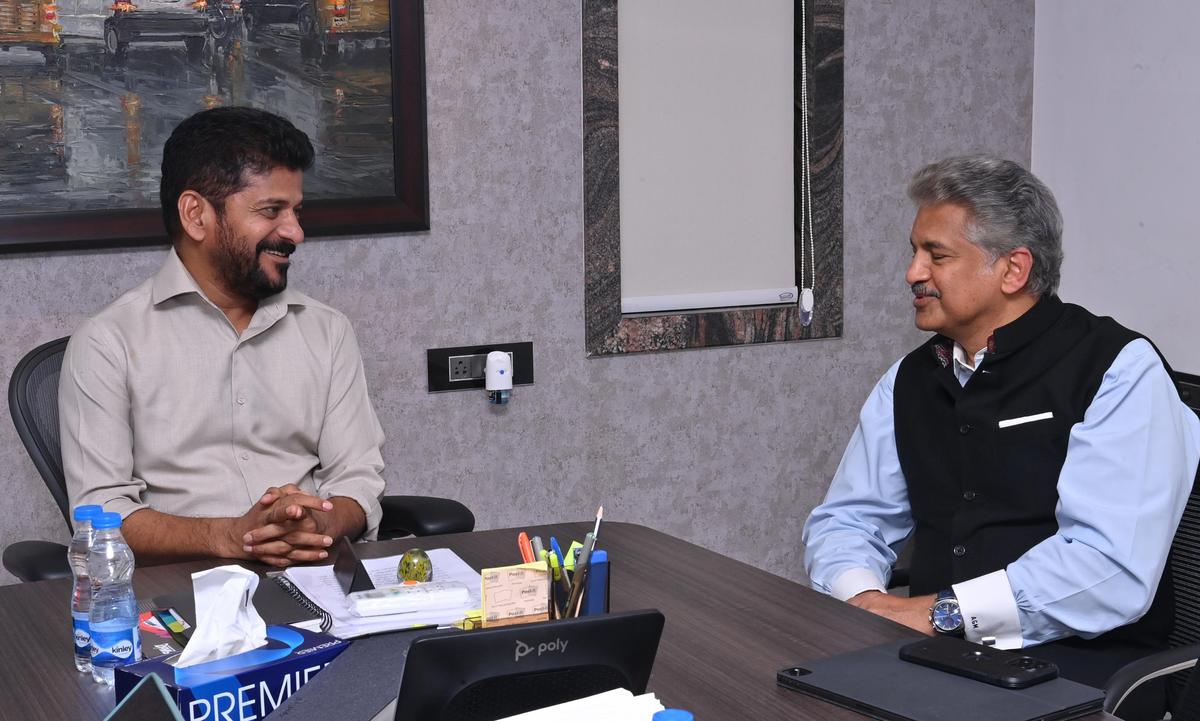 Telangana Chief Minister A. Revanth Reddy with Anand Mahindra, chairman of Mahindra Group. File