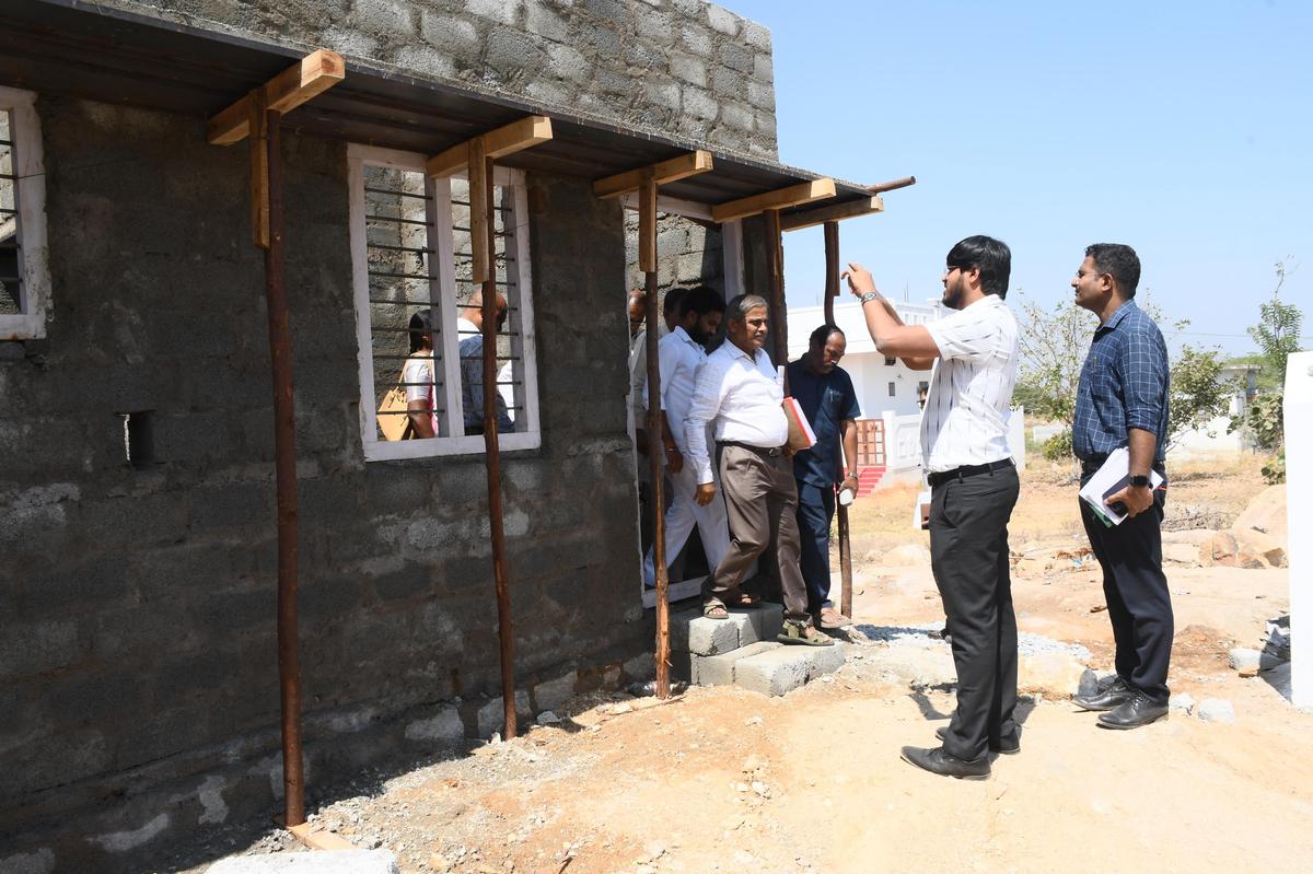 Telangana State Housing Corporation Limited’s managing director V.P. Gautham along with officials checking Indiramma Houses under construction in Wanaparthy district on Monday. Telangana State Housing Corporation Limited’s managing director V.P. Gautham along with officials checking Indiramma Houses under construction in Wanaparthy district on Monday.