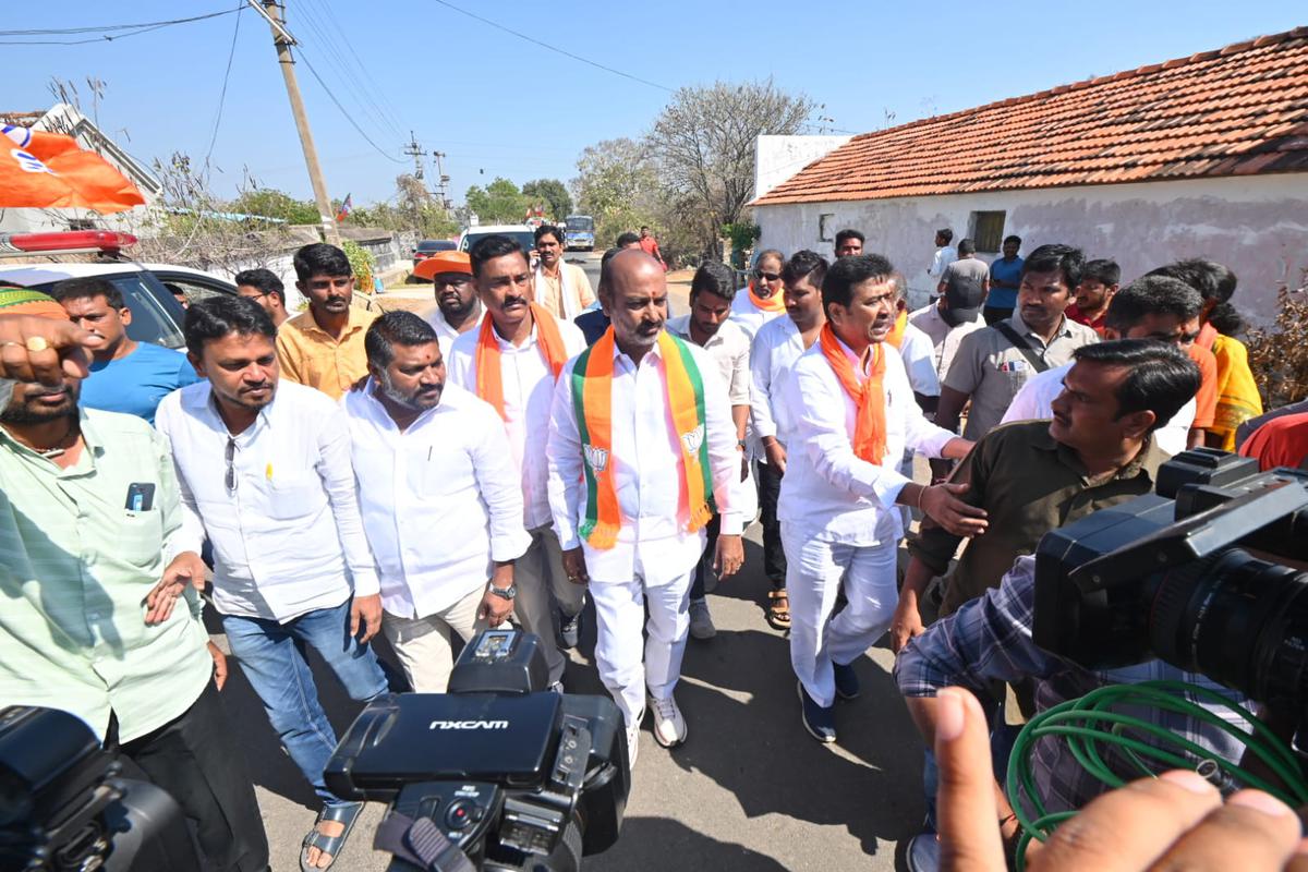 BJP national general secretary and Karimnagar MP Bandi Sanjay Kumar during his second day of the final leg of Prajahitha Padayatra at Bommanapalli village in Chigurumamidi mandal of Karimnagar district on Tuesday.