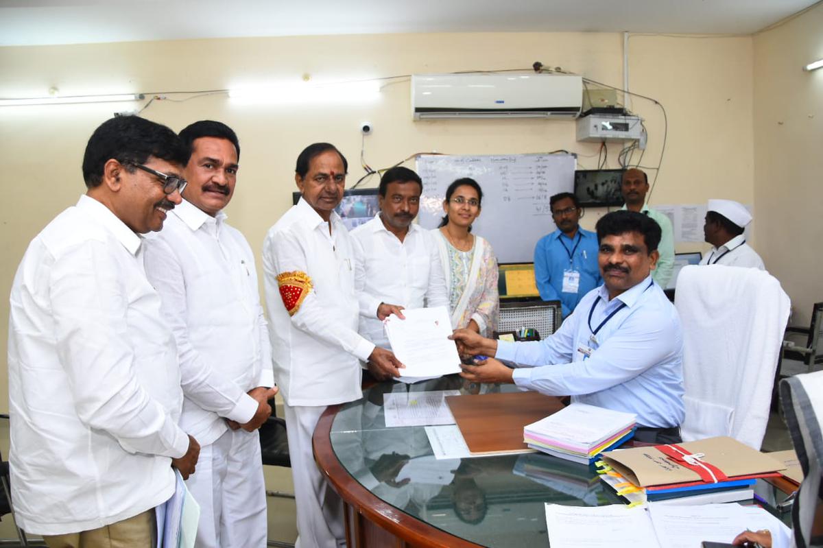 BRS president and Chief Minister K. Chandrasekhar Rao filing his nomination papers to the Returning Officer in Kamareddy on November 09, 2023. Sitting MLA Gampa Goverdhan is also seen