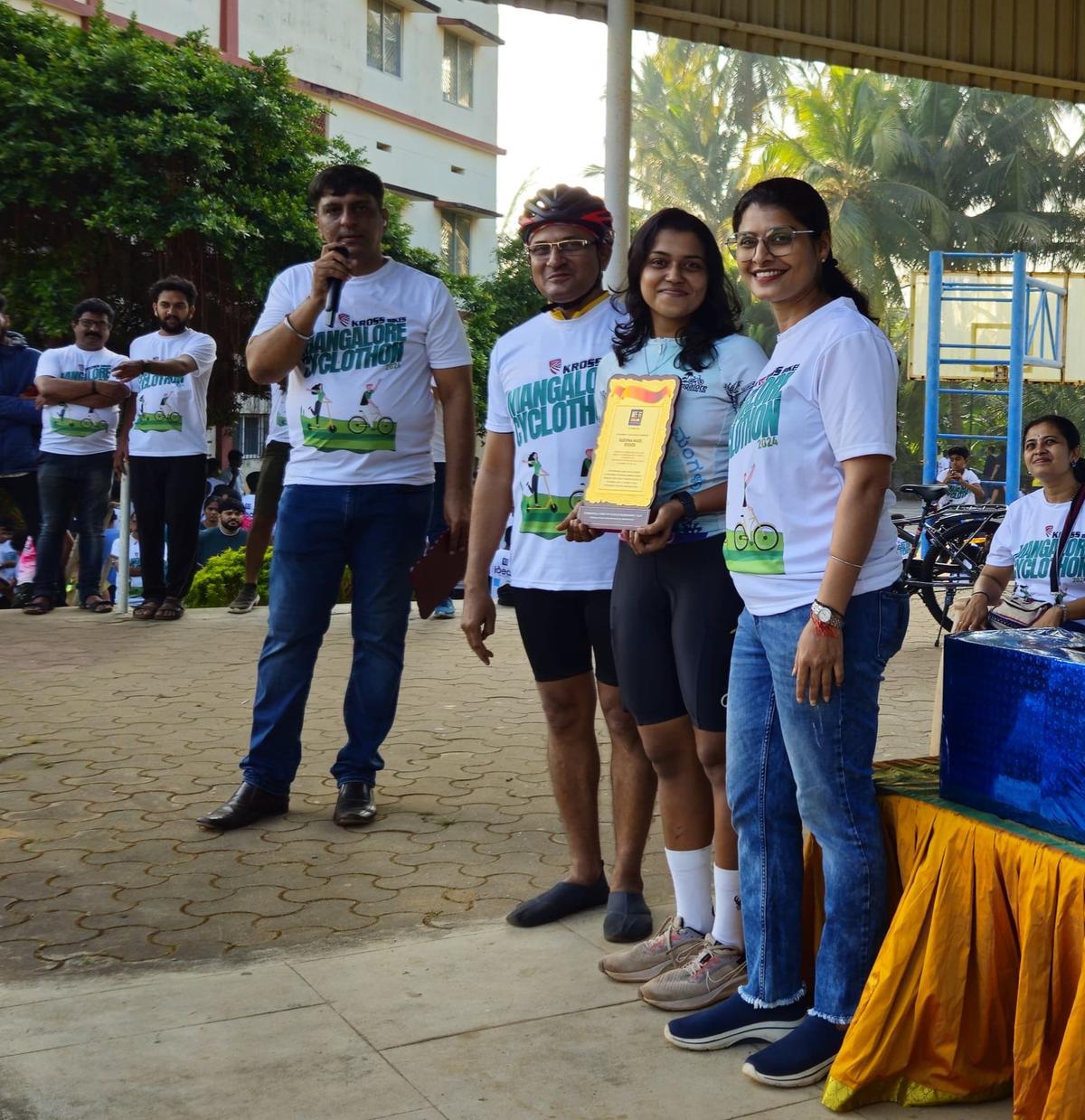 Members of We R Cycling, a cycling club, felicitatingGleona D’Souza, who represented Karnataka in the Senior Women’s category in the National Cycling event at the conclusion of Kross Mangalore Cyclothon in Mangaluru on Sunday.