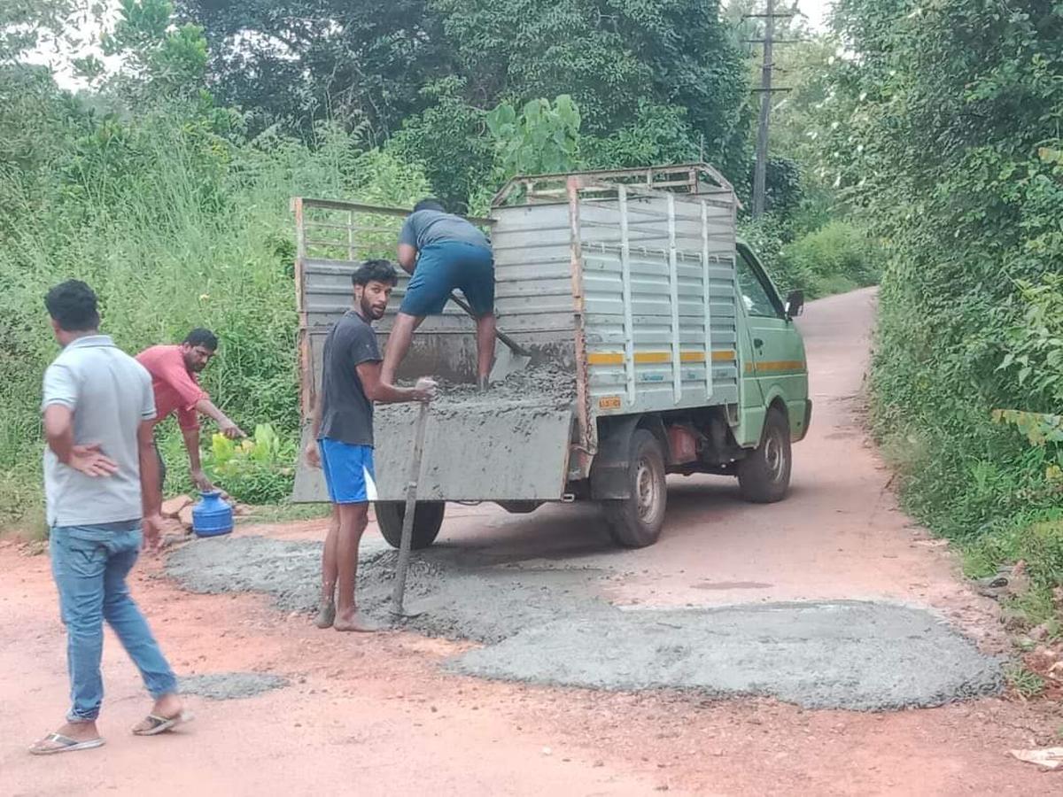 A few youth teamed up to restore the battered stretch of a concrete road at Maravanthe village in Byndoor taluk of Udupi district, on October 6, 2024.