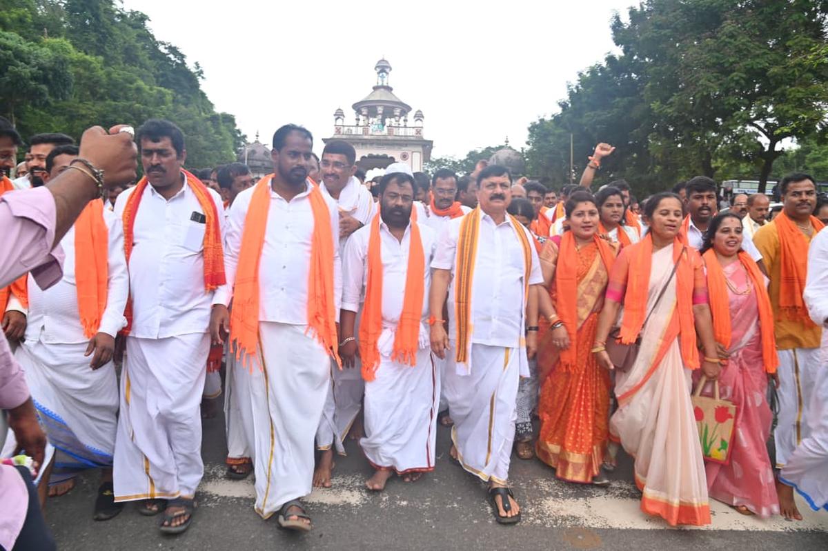 MLA for Tirthahalli and former Minister Araga Jnanendra leading devotees from Tirthahalli to express solidarity with Sri Kshetra and Pattadhikari D. Veerendra Heggade at Dharmasthala on Saturday. MLA for Tirthahalli and former Minister Araga Jnanendra leading devotees from Tirthahalli to express solidarity with Sri Kshetra and Pattadhikari D. Veerendra Heggade at Dharmasthala on Saturday.