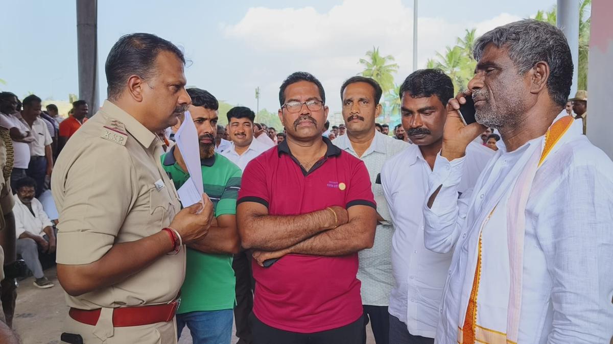 Udupi-Chikkamagaluru MP Kota Srinivas Poojary spoke to Udupi Deputy Commissioner K. Vidyakumari to resolve the toll collection issue for commercial vehicles registered within Kota Zila Panchayat constituency, at the Sasthana Toll Plaza in Udupi district on December 22, 2024.