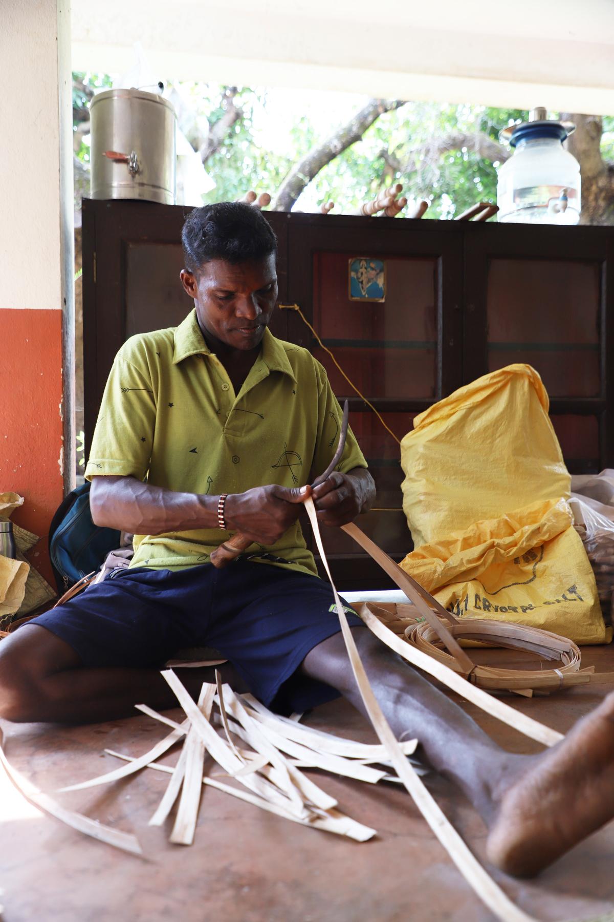 Babu Koraga Kadtala demonstrates traditional basket making at a workshop organised to mark World Heritage Week in Mangaluru.