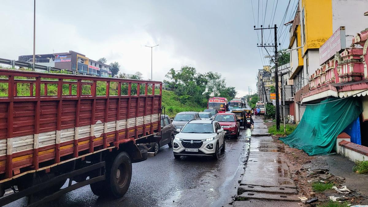 Potholes on Pumpwell Circle flyover service road slow vehicles entering Mangaluru