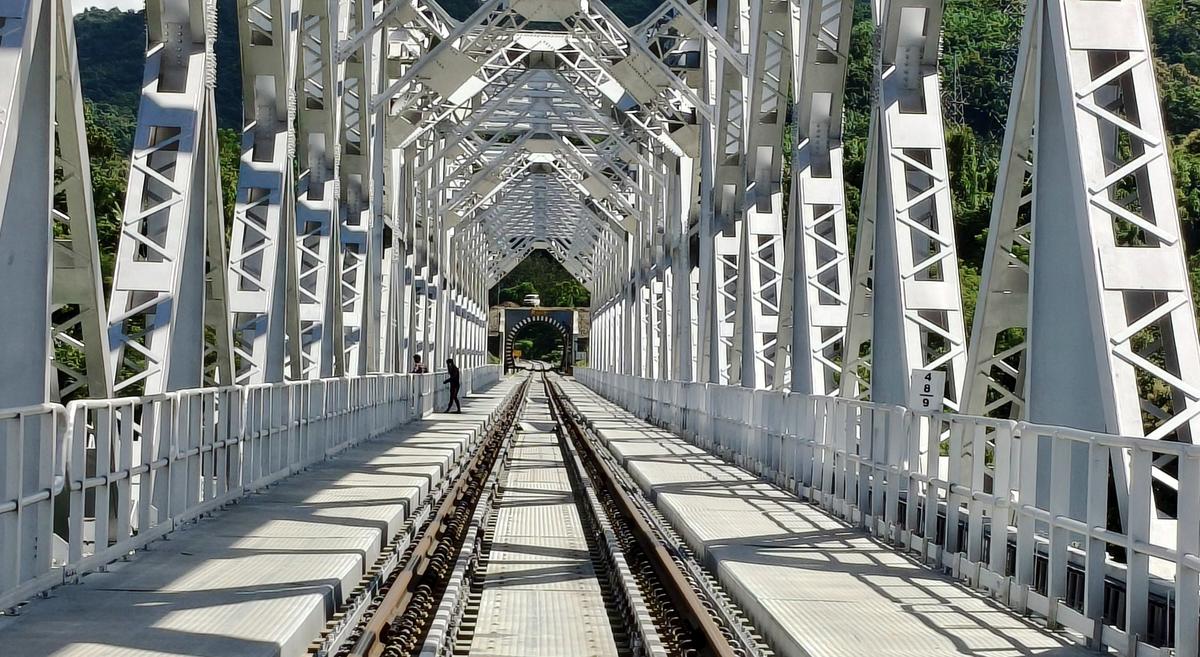 The Krung Bridge at Sairang, 20 km from Mizoram capital Aizwal, is said to be 114 m tall from the Krung Valley. Northeast Frontier Railway is building a 51 km new line from Bairabi, the first station in Mizoram on Assam border to Sairang in its mission to connect all NE states with railway network. The Krung Bridge at Sairang, 20 km from Mizoram capital Aizwal, is said to be 114 m tall from the Krung Valley. Northeast Frontier Railway is building a 51 km new line from Bairabi, the first station in Mizoram on Assam border to Sairang in its mission to connect all NE states with railway network.