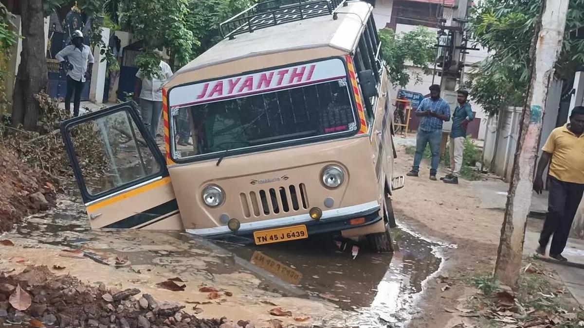 School van gets stuck in trench dug for UGD in Tiruchi