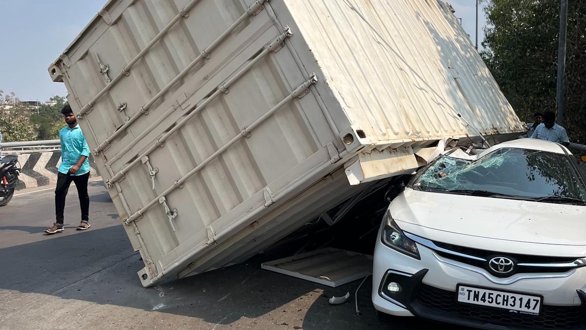 Narrow escape for couple as container from truck lands on their car