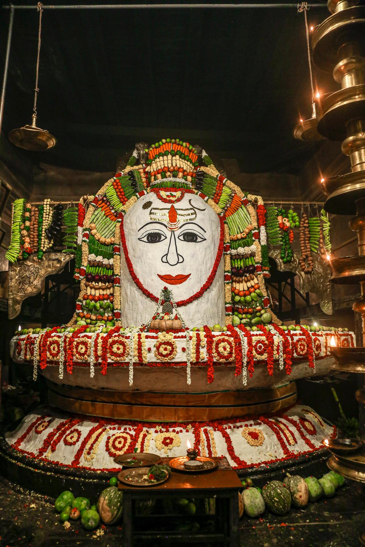 Presiding deity at Big Temple, Thanjavur covered with rice, vegetables, fruits, sweets and flowers on the occasion of ‘Annabishekam’ on Wednesday.