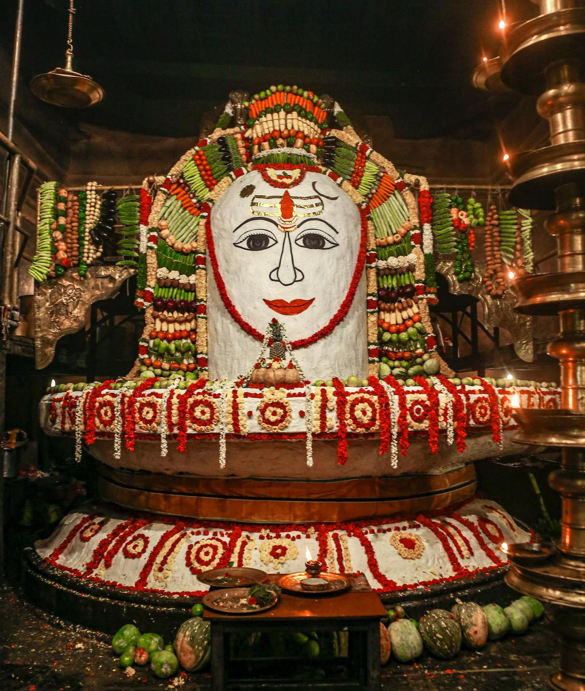 Presiding deity at Big Temple, Thanjavur covered with rice, vegetables, fruits, sweets and flowers on the occasion of ‘Annabishekam’ on Wednesday.