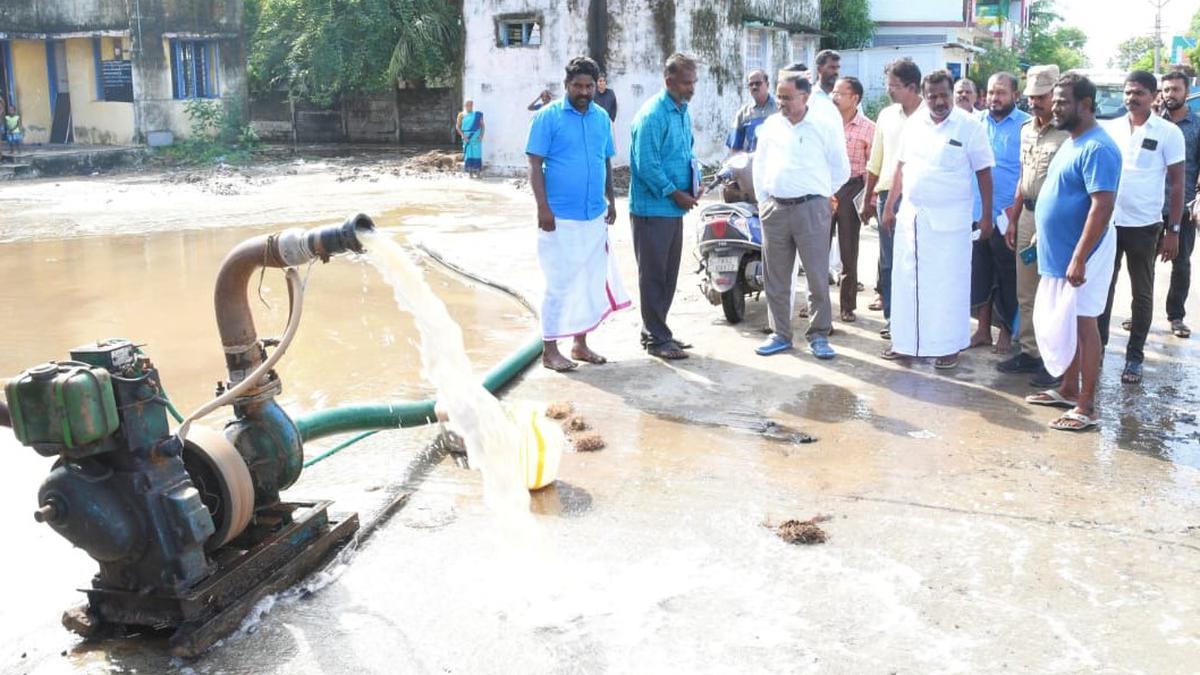 Farmers begin to drain water from inundated fields to save the standing paddy crop in Mayiladuthurai and Nagapattinam districts