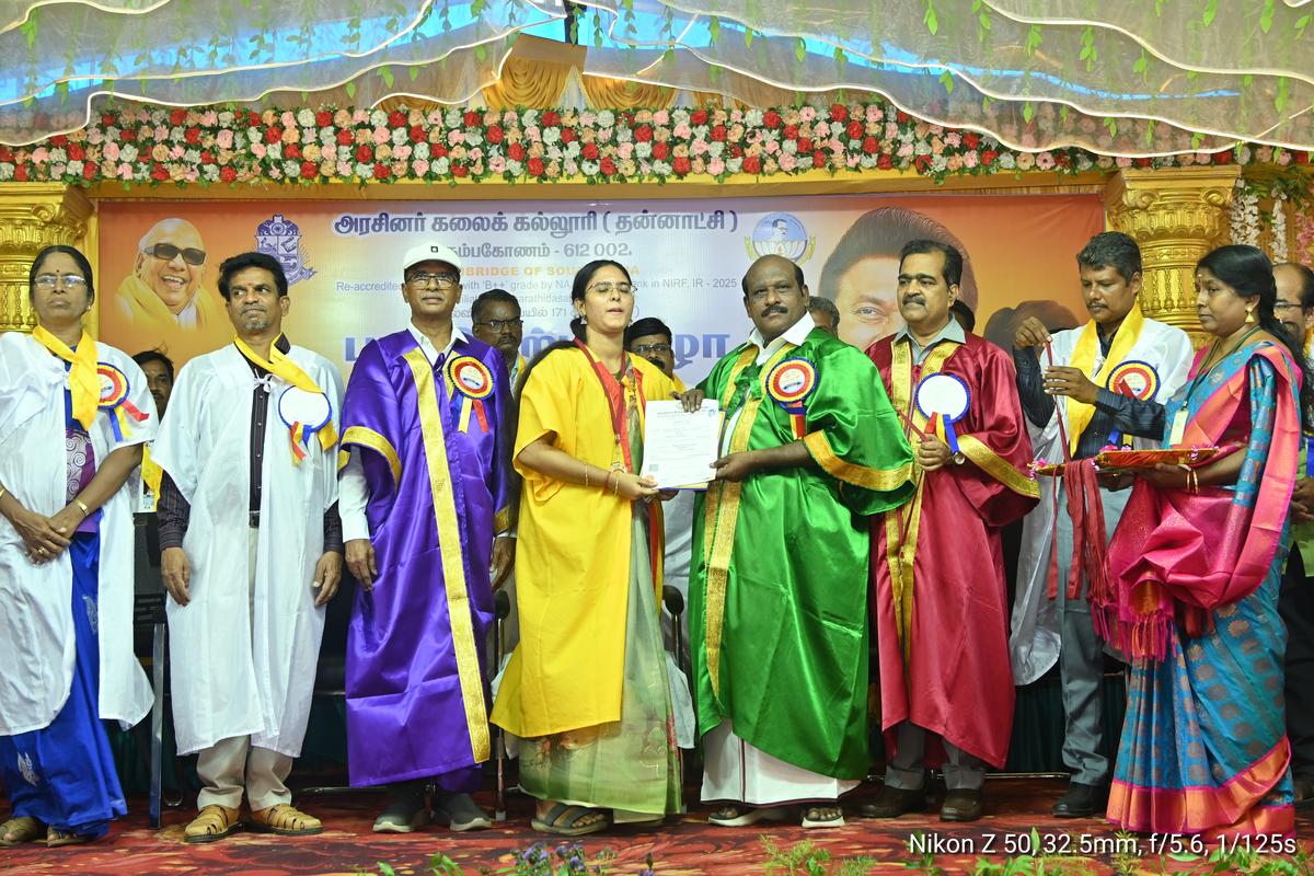 Higher Education Minister Govi. Chezhiaan distributes the degree certificate to a candidate during the convocation at Government Arts College, Kumbakonam.