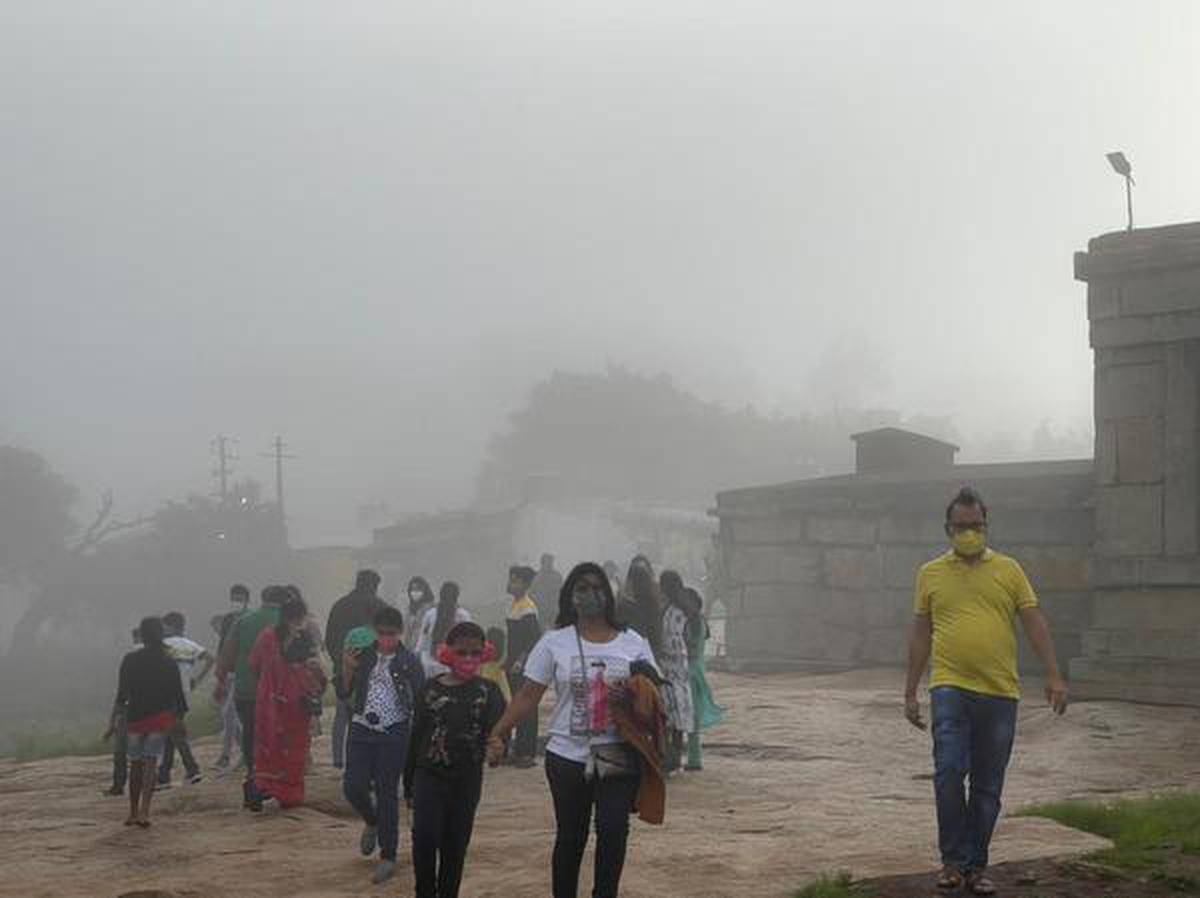 Floating in mist, Nandi Hills draws visitors - The Hindu