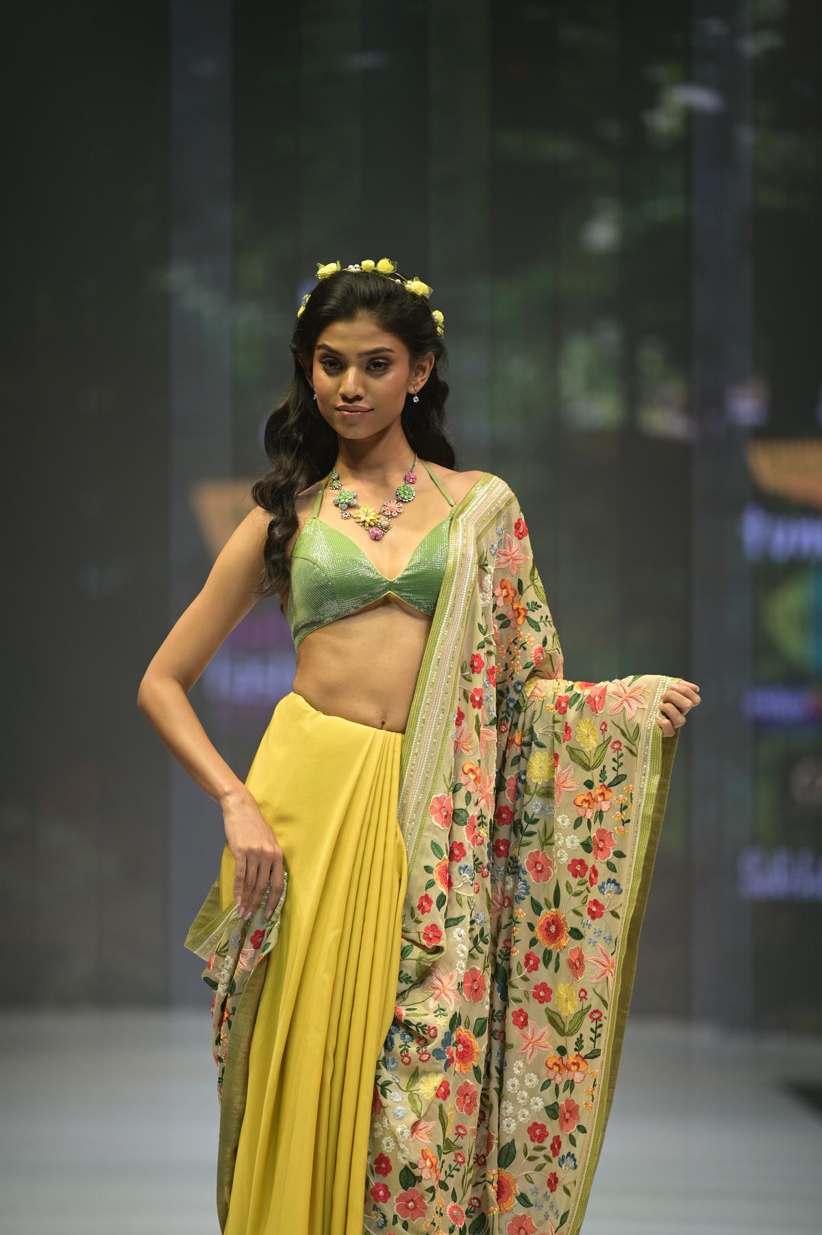 A model wearing a Ganesh Nallari’s creation at Bangalore Fashion Week 2024 