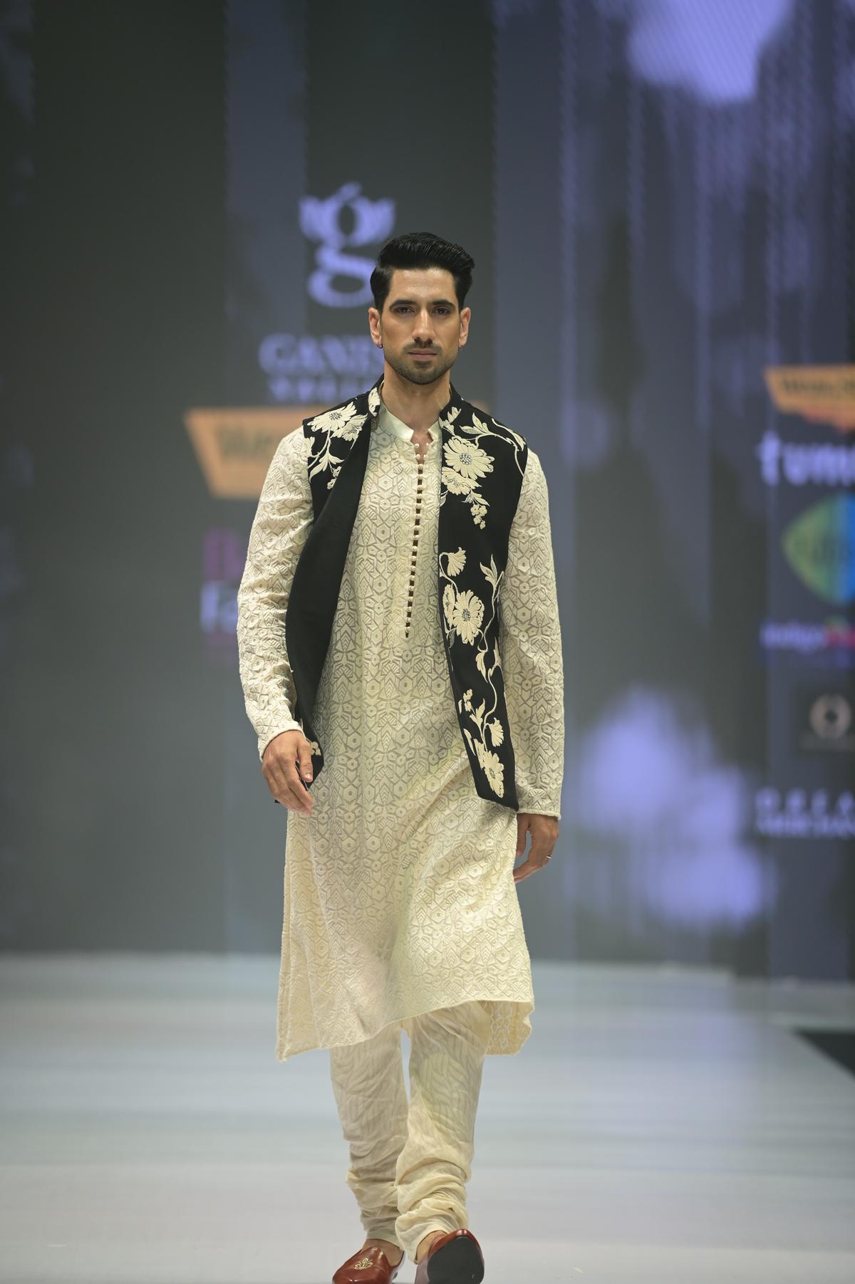 A model wearing a Ganesh Nallari’s creation at Bangalore Fashion Week 2024 