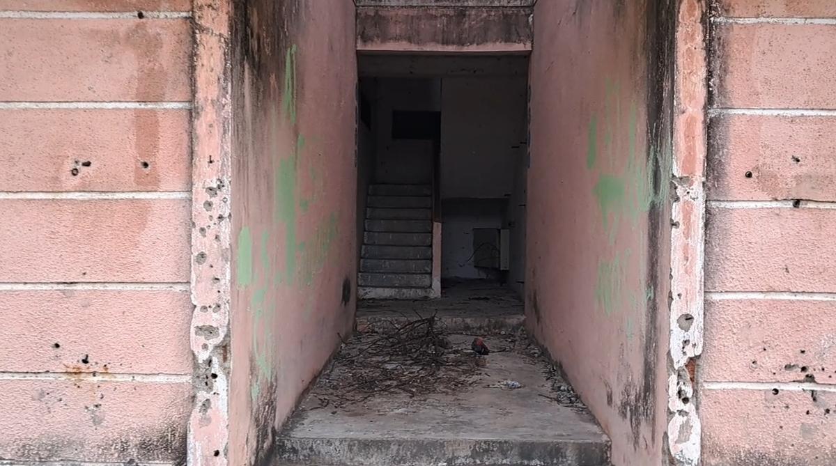 Unidentified persons often defecate inside these empty houses, they complain
