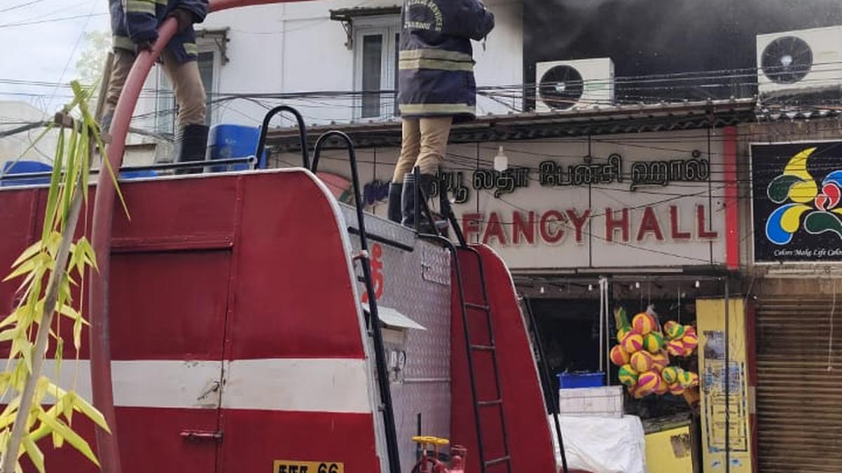 Stationery shop catches fire on Dhandeeswaram High Road in Velachery