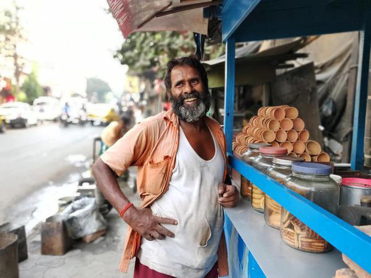 Regular customers of K Chandran's tea shop in Thiruvananthapuram have  formed close-knit communities - The Hindu