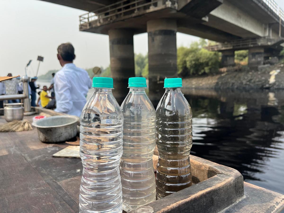 Water sample collected from Diwale creek kept in a bottle (dark grey) to compare the level of pollution with other two bottles. 