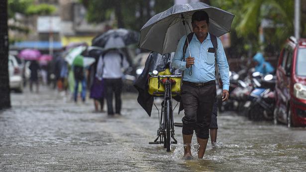 Heavy rains in Mumbai amid orange alert; local train, bus services unaffected