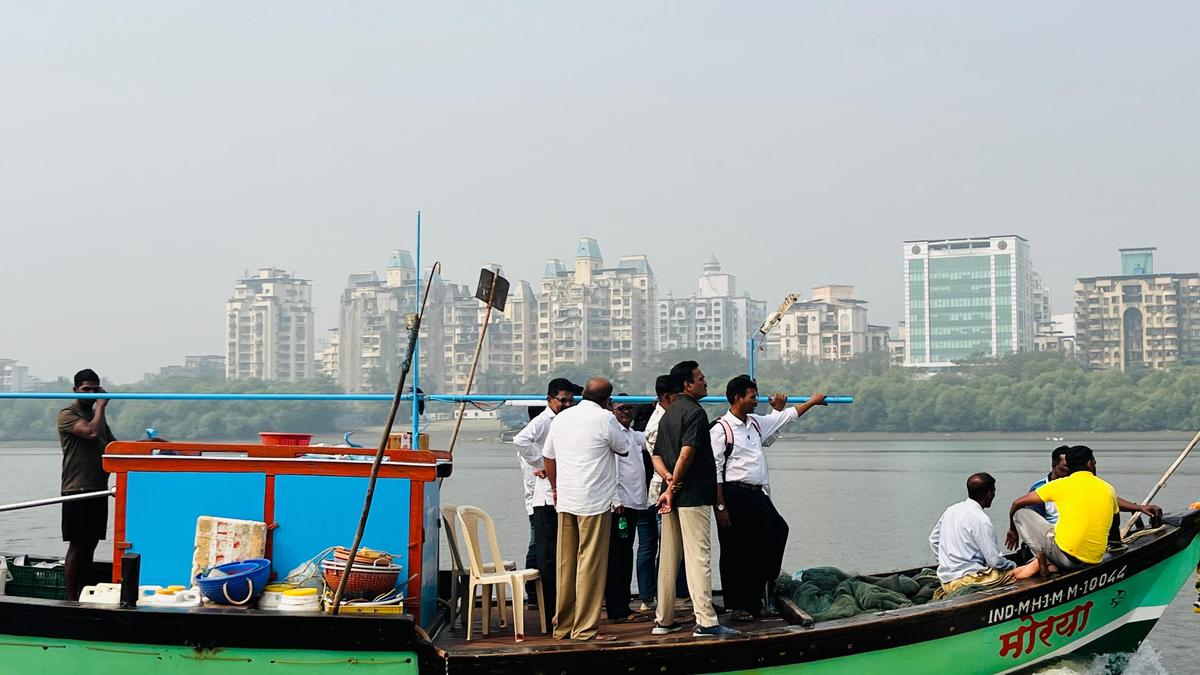 Traditional fishermen along with a team of water testing officials inspect the water bodies in Navi Mumbai. 