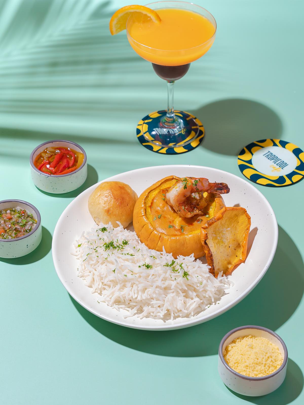 Shrimp stuffed pumpkin served with Brazilian cheese bread and rice.