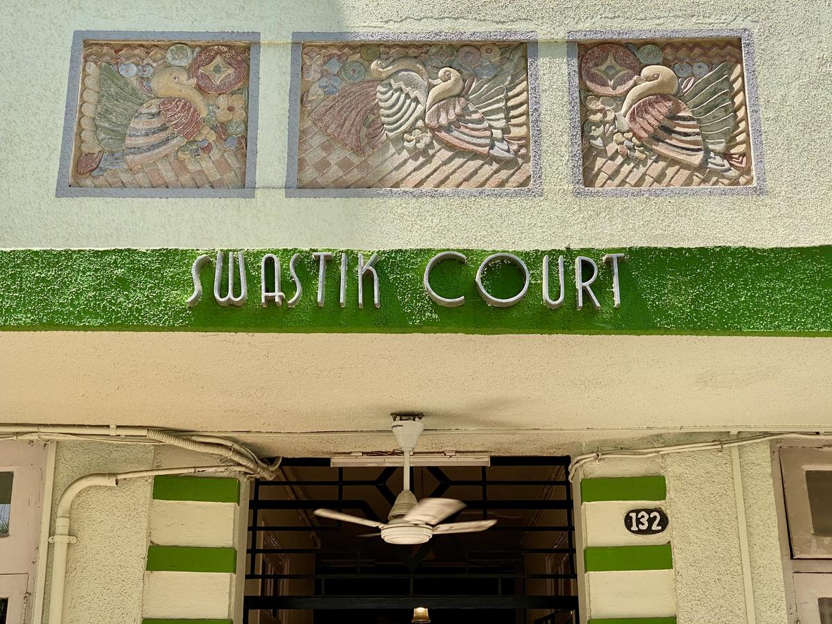 Swastik Court lettering and bas-relief after restoration and repair. 
