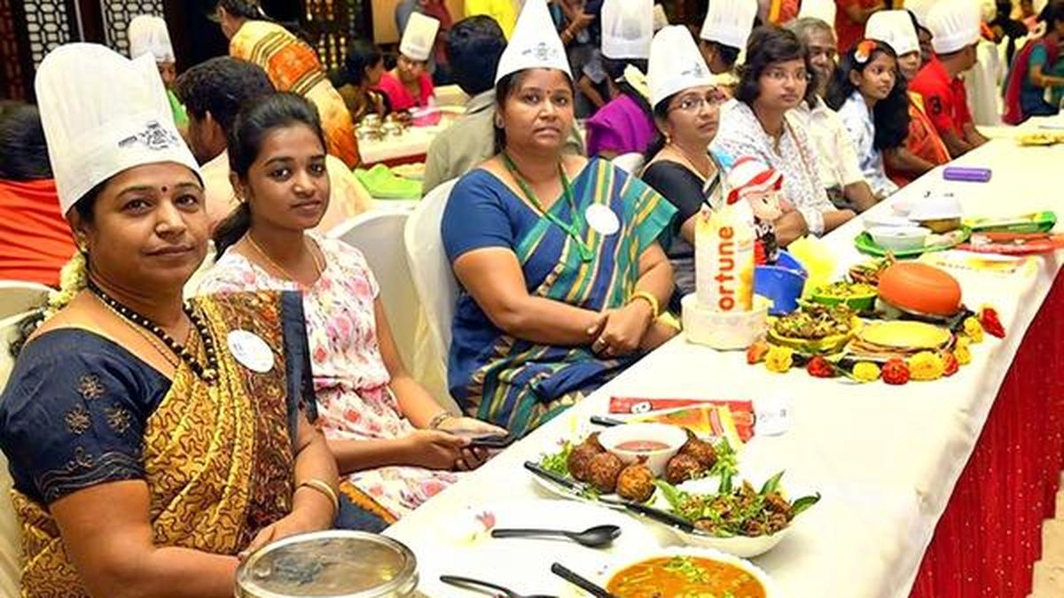 Wielding the ladle to cook up a traditional spread The Hindu