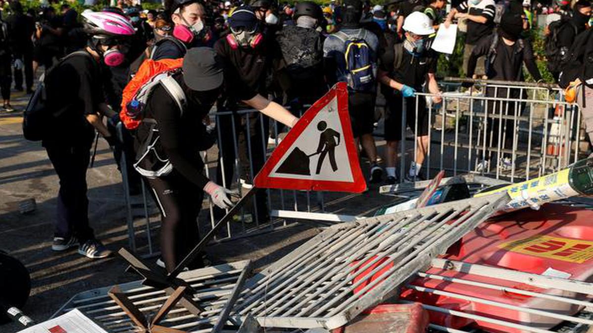 Demonstrators march in Hong Kong in new weekend of protest