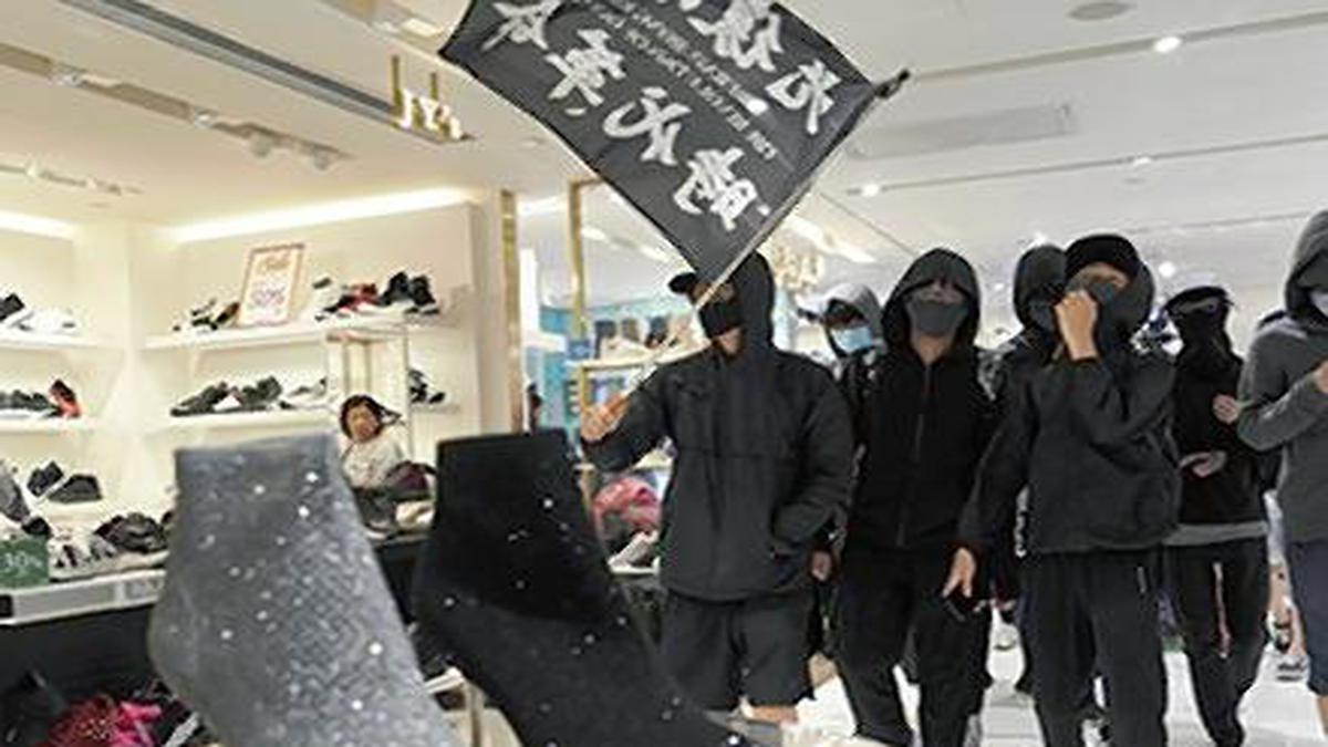 Hong Kong marchers target malls on third day of Christmas protests