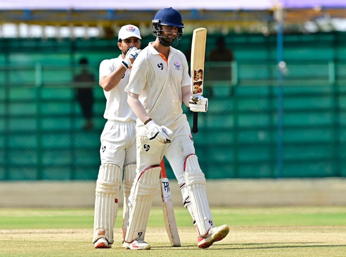 Jammu and Kashmir batter Qamran Iqbal celebrates his century on day 5 of the Ranji Trophy final against Karnataka in Hubbali on February 28, 2026